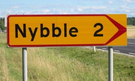 [Road sign: Nybble 2>]